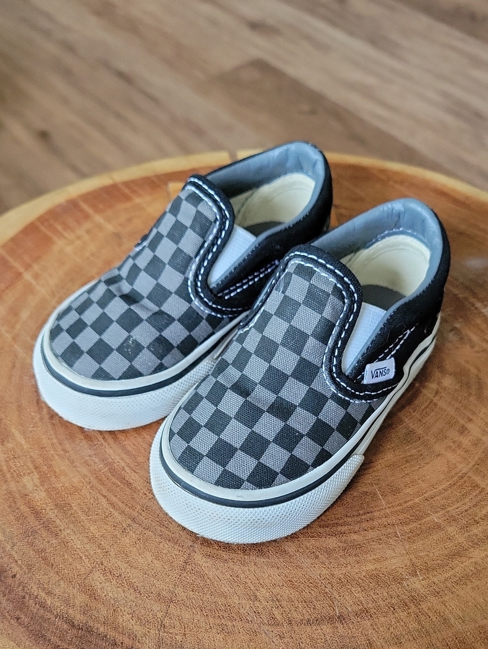 Vans Toddler Checkerboard Slip-On Sneakers in Black and Gray